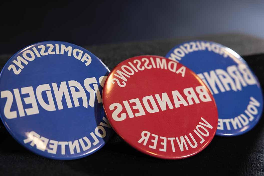 Vintage blue and red Brandeis Admissions Volunteer pins